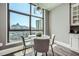 Bright breakfast nook featuring city views, modern lighting, and comfortable seating at 750 Park Ne Ave # 18S, Atlanta, GA 30326