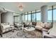 Living room featuring comfortable seating and floor to ceiling windows at 750 Park Ne Ave # 18S, Atlanta, GA 30326