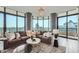 Bright living room with floor to ceiling windows and city views at 750 Park Ne Ave # 18S, Atlanta, GA 30326