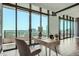 Bright office space with a desk, chair, and large windows overlooking a city view at 750 Park Ne Ave # 18S, Atlanta, GA 30326