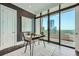 The bright office provides city views, hardwood floors, and an outdoor patio for fresh air at 750 Park Ne Ave # 18S, Atlanta, GA 30326