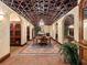 Elegant wine cellar with decorative ceiling, arched doorways, and ample storage for wine connoisseurs at 750 Park Ne Ave # 18S, Atlanta, GA 30326