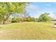 Expansive backyard with a mature trees, providing a peaceful and private outdoor space at 1955 Starr Sw Rd, Conyers, GA 30094