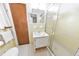 Bathroom featuring a shower with sliding glass doors, a toilet, and a vanity sink at 1955 Starr Sw Rd, Conyers, GA 30094