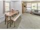 Dining room featuring a modern dining table and bench, with ample space for gatherings at 1955 Starr Sw Rd, Conyers, GA 30094