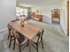 Stylish dining area with a table set for four, complemented by bright natural light at 1955 Starr Sw Rd, Conyers, GA 30094