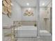 Bathroom featuring bathtub, walk in shower, and neutral tile at 8033 Louis Dr, Locust Grove, GA 30248