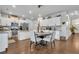 Bright open-concept kitchen with stainless appliances and large island at 8033 Louis Dr, Locust Grove, GA 30248