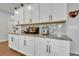 Kitchen counter features granite countertops and stylish white cabinetry at 8033 Louis Dr, Locust Grove, GA 30248