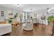 Bright living room with hardwood floors, decorative lighting, and stylish furniture at 8033 Louis Dr, Locust Grove, GA 30248