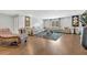 Cozy living room with hardwood floors, modern decor, and comfortable seating at 8033 Louis Dr, Locust Grove, GA 30248