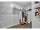 Walk-in Closet featuring shelving and racks at 8033 Louis Dr, Locust Grove, GA 30248