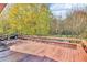 Large wooden deck with ample space for seating, providing a relaxing outdoor retreat at 831 Sinyard Rd, Lithia Springs, GA 30122