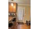 Kitchen door with plantation shutters and a breakfast bar with seating at 831 Sinyard Rd, Lithia Springs, GA 30122