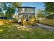 Backyard with a wooden fence, deck, and lush greenery offers outdoor living space at 1045 Mcdaniel St, Atlanta, GA 30310