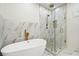 Elegant bathroom featuring soaking tub and glass-enclosed shower at 1045 Mcdaniel St, Atlanta, GA 30310