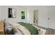 Tranquil bedroom with a view of the ensuite bathroom and a window providing ample natural light at 1045 Mcdaniel St, Atlanta, GA 30310