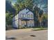 Two-story home with black trim and a covered entry is located on a quiet street at 1045 Mcdaniel St, Atlanta, GA 30310