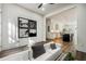 Open concept living room area with a view of the kitchen island at 1045 Mcdaniel St, Atlanta, GA 30310