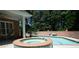 Backyard view with a pool, jacuzzi, privacy fence, seating and beautiful foliage at 84 Nw Gloster Nw Rd, Lawrenceville, GA 30044