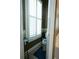 Powder room featuring a toilet and a window with plantation shutters at 84 Nw Gloster Nw Rd, Lawrenceville, GA 30044