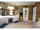 Bathroom with a large mirror, vanity, and a walk in shower at 84 Nw Gloster Nw Rd, Lawrenceville, GA 30044