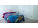 Cozy bedroom with neutral walls, plush carpet, and a double closet at 84 Nw Gloster Nw Rd, Lawrenceville, GA 30044