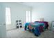 Bright bedroom features fresh neutral paint, plush carpeting, and sun-filtering window shutters at 84 Nw Gloster Nw Rd, Lawrenceville, GA 30044