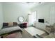 bedroom with carpeted floor, a bed, desk, rug, and furniture with lots of natural light at 84 Nw Gloster Nw Rd, Lawrenceville, GA 30044