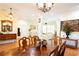 Dining room view leading to living room showcasing open floor plan and hardwood floors at 84 Nw Gloster Nw Rd, Lawrenceville, GA 30044