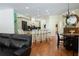 Bright eat-in kitchen with an island, breakfast bar, and hardwood floors at 84 Nw Gloster Nw Rd, Lawrenceville, GA 30044