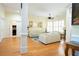 Bright living room featuring hardwood floors, neutral paint, and plantation shutters at 84 Nw Gloster Nw Rd, Lawrenceville, GA 30044