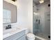 A modern bathroom featuring gray subway tile in the glass enclosed shower at 193 High Creek Dr, Roswell, GA 30076