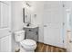 Bathroom with modern vanity, hardware, lighting, and fixtures at 193 High Creek Dr, Roswell, GA 30076