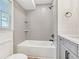 Bathroom featuring tub and tiled shower surround at 193 High Creek Dr, Roswell, GA 30076