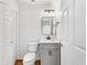Bathroom with modern vanity, hardware, lighting, and fixtures at 193 High Creek Dr, Roswell, GA 30076