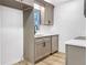 Modern kitchen featuring stainless steel appliances, granite countertops, and custom cabinetry at 193 High Creek Dr, Roswell, GA 30076