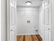 Spacious laundry room with tile floors and washer/dryer hookups at 193 High Creek Dr, Roswell, GA 30076