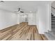 Open living room with new wood floors, recessed lighting, and easy access to other rooms at 193 High Creek Dr, Roswell, GA 30076