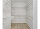 Walk-in closet with custom wire shelving for ample storage at 193 High Creek Dr, Roswell, GA 30076