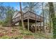 Multi-level deck with views of the wooded backyard at 2183 Seaman Cir, Atlanta, GA 30341
