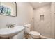 Updated bathroom with decorative tile shower and modern fixtures at 2183 Seaman Cir, Atlanta, GA 30341