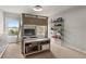 This bedroom features a lofted bed, a desk, and large windows that let in plenty of natural light at 260 Millstone Pkwy, Woodstock, GA 30188