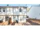 Back of house with sliding doors and a small backyard at 2960 Fields Dr, Lithonia, GA 30038