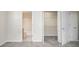A primary bedroom with an attached bath and walk-in closet at 2960 Fields Dr, Lithonia, GA 30038