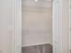 Walk-in closet with shelves for storage and organization at 2960 Fields Dr, Lithonia, GA 30038
