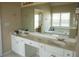 Bathroom features a vanity with double sinks at 3220 Warren Creek Dr, Powder Springs, GA 30127