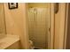 A cozy bathroom with a shower-tub combination is partially seen behind a patterned curtain at 3220 Warren Creek Dr, Powder Springs, GA 30127