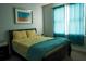 Bright bedroom featuring two windows and neutral decor at 3220 Warren Creek Dr, Powder Springs, GA 30127