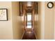 Hallway with hardwood floors and decor at 3220 Warren Creek Dr, Powder Springs, GA 30127